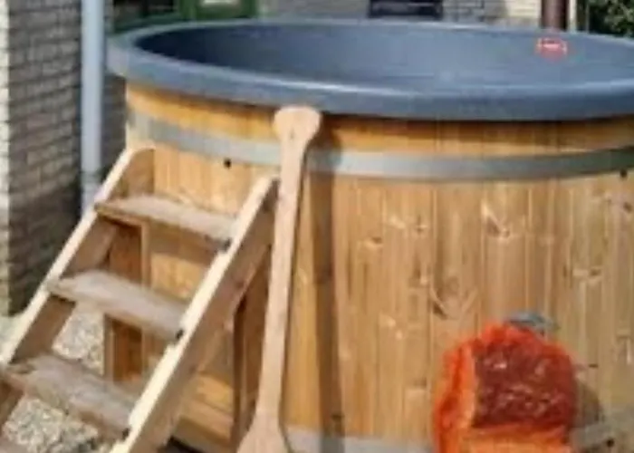 펜션 En Duinen 331 Omheinde Tuin 줄리아나도르프